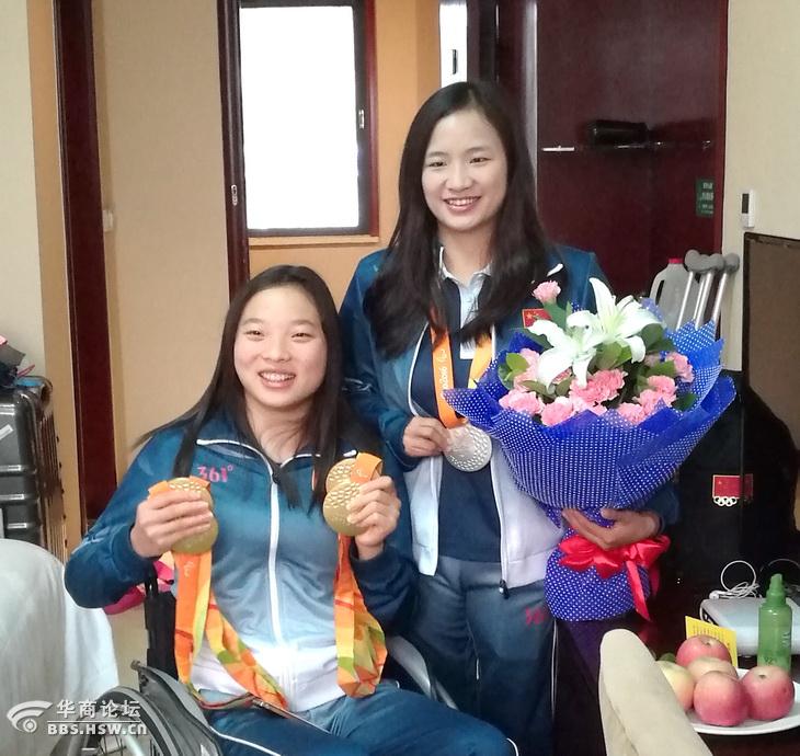 两位残奥会冠军张丽张英凯旋归来