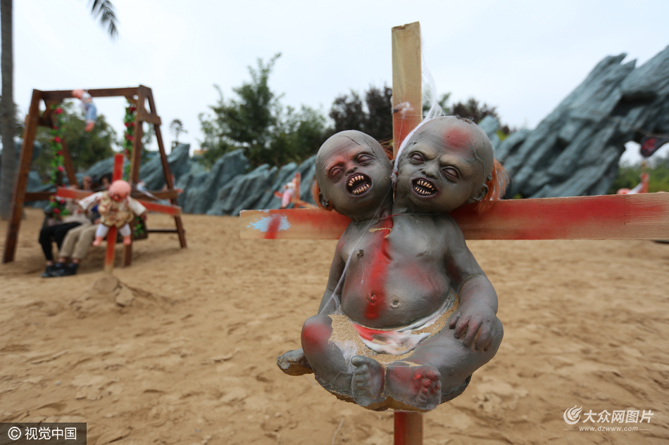 郑州现弃婴岛大量仿真娃娃被钉十字架