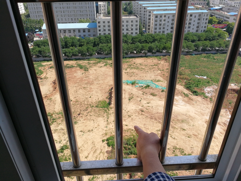 扶风县医院新楼影响小区采光追踪：业主希望公开设计方案