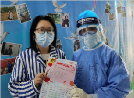 火神山医院的“三八节”：一张祝福卡 温暖患者心
