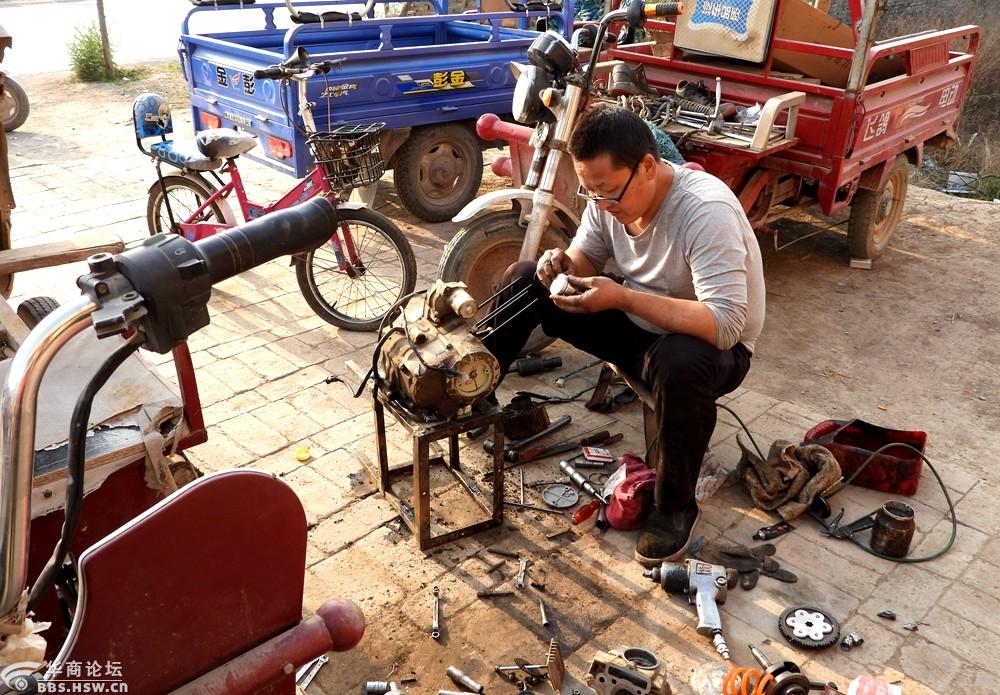 实拍在农村公路旁的夫妻修车行!